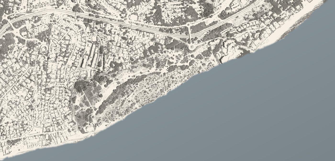 The same frame of the Cabopino coast today, with the marina cut into the shore