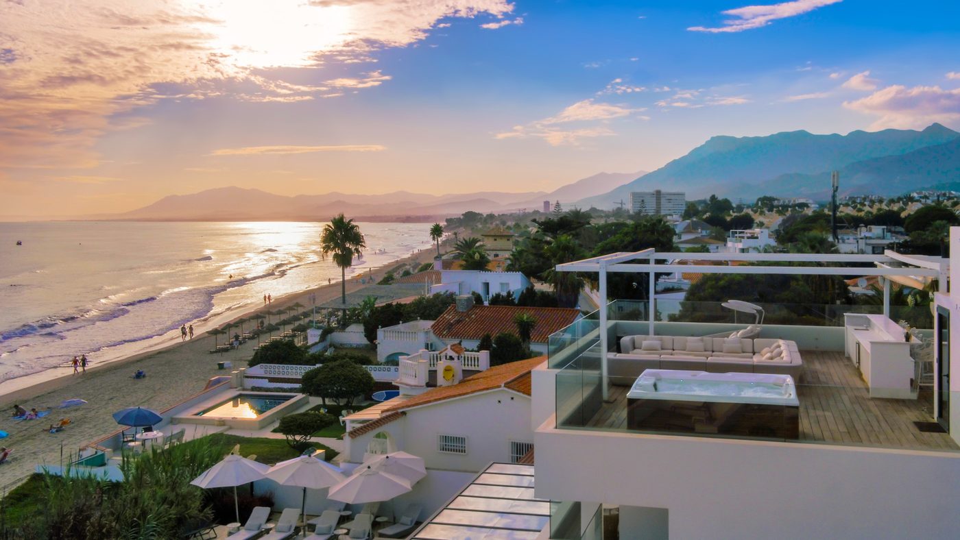Sunset over the bay from a roof terrace in Costabella, Marbella