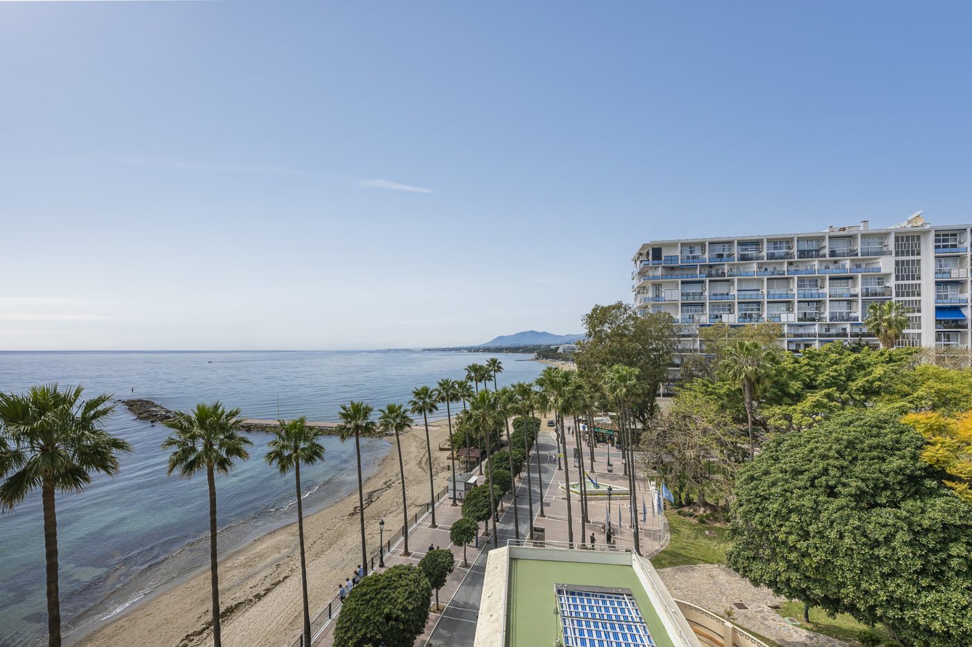 The palm walk and the beach along the seafront in central Marbella