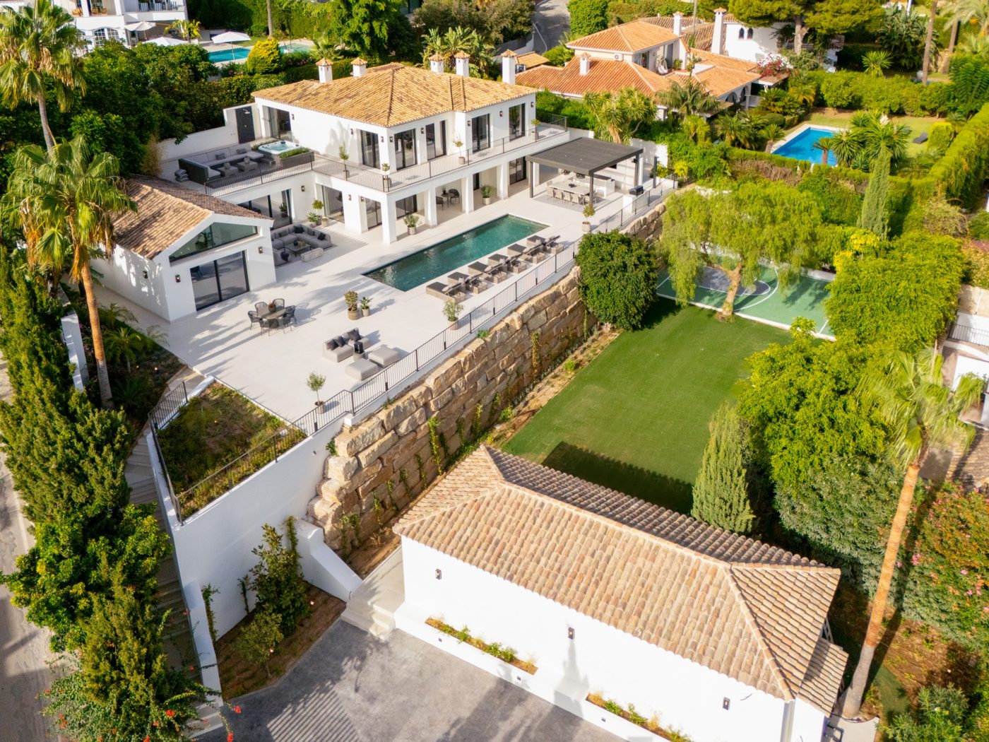 Nagüeles from above, villas and gardens on the first hillside