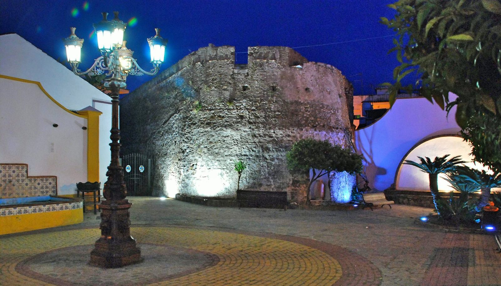 Castillo de San Luis lit at night in Estepona's old town