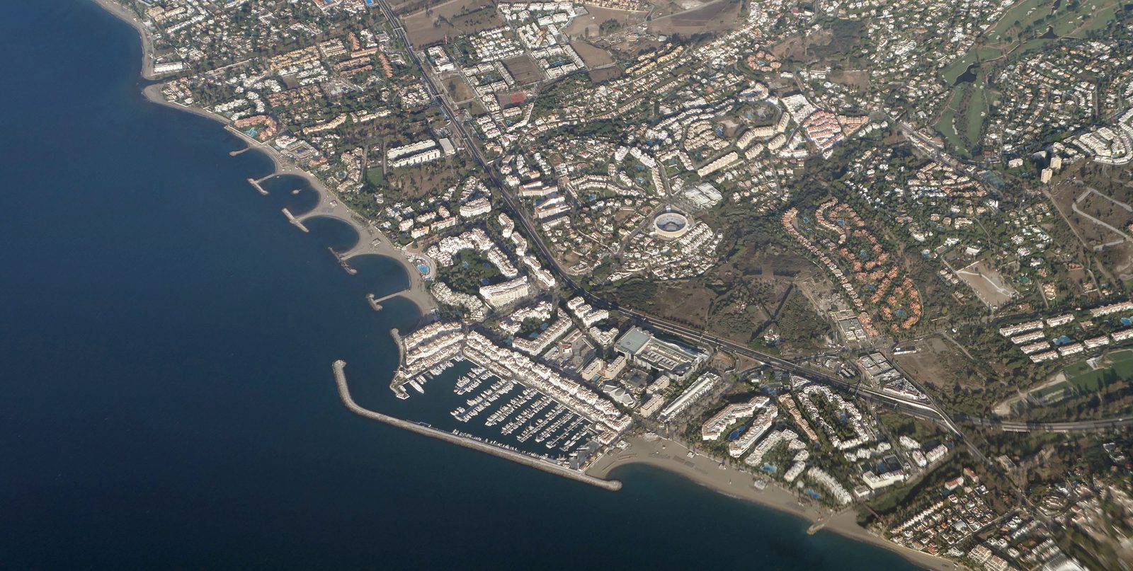 Aerial view of Puerto Banús marina and the Nueva Andalucía coastline
