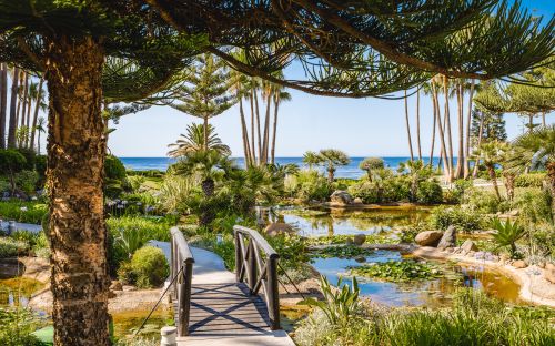 Elegant Renovated Beachfront Garden Apartment