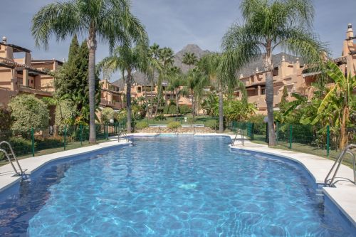 West-facing 3-bed on the Golden Mile with pool & gardens