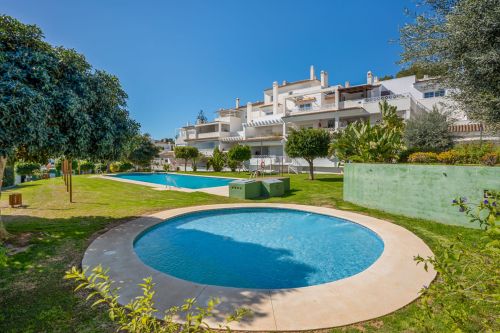Bright south west-facing two bedroom apartment located in the gated community of Lomas de Rio Real, Marbella