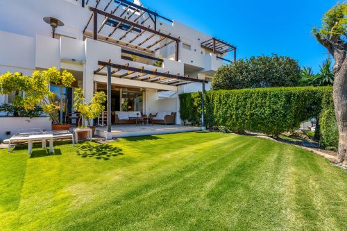 Spacious three-bedroom ground floor apartment situated in the gated community of Las Jacarandas, Bel Air