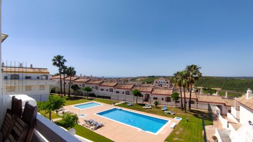 2-Bedroom Duplex with Solarium, Private Garage and Direct Pool Access in Royal Manilva