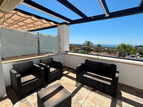 Elegant South-Facing Duplex Townhouse with Sea Views in Santa Clara Golf, Marbella