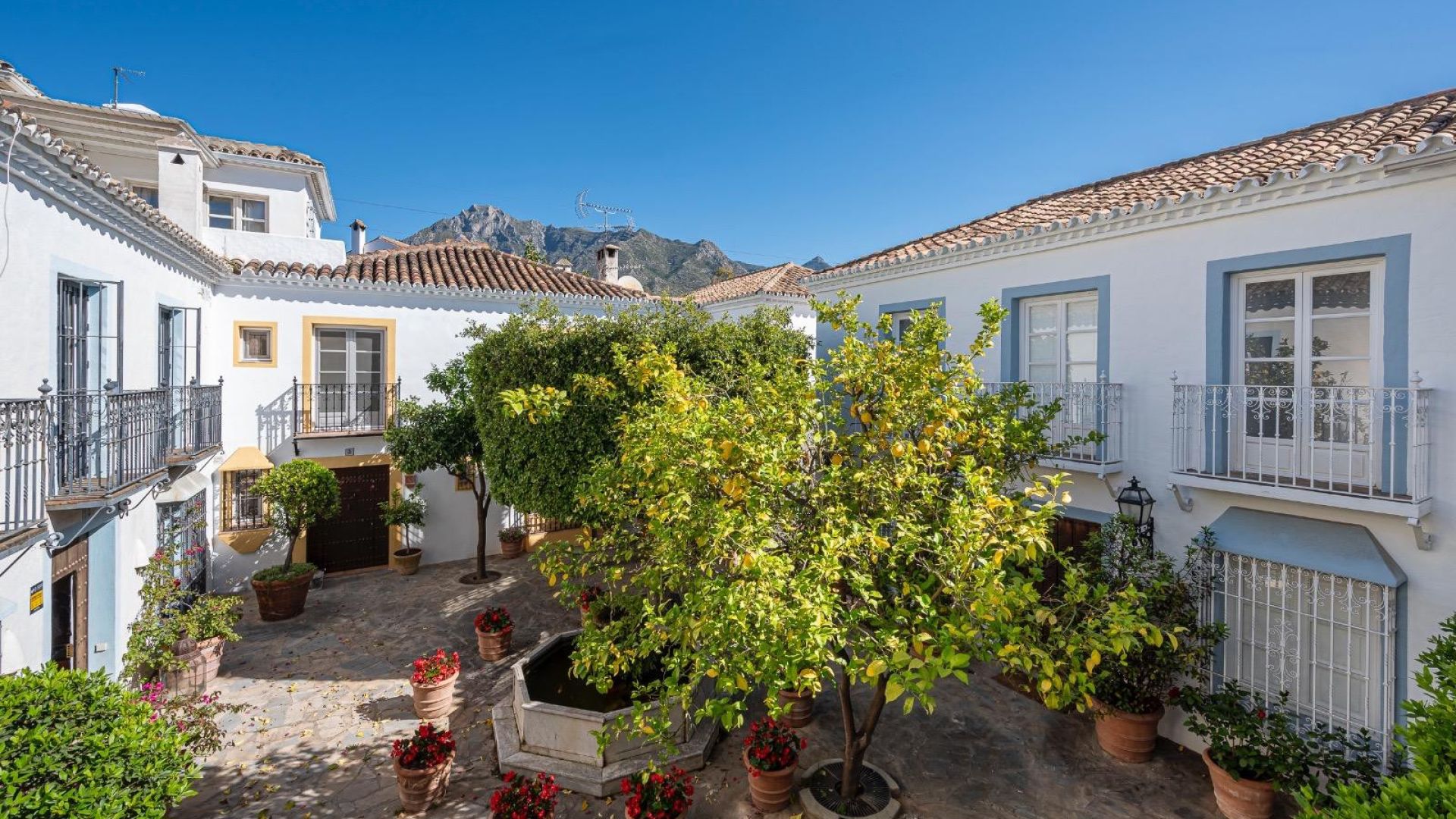 Charming townhouse with contemporary comfort in an Andalusian Mediterranean village on the Golden Mile.